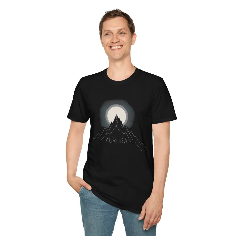 Man wearing Aurora Mountain Unisex T-Shirt with moon and mountain graphic, ribbed collar