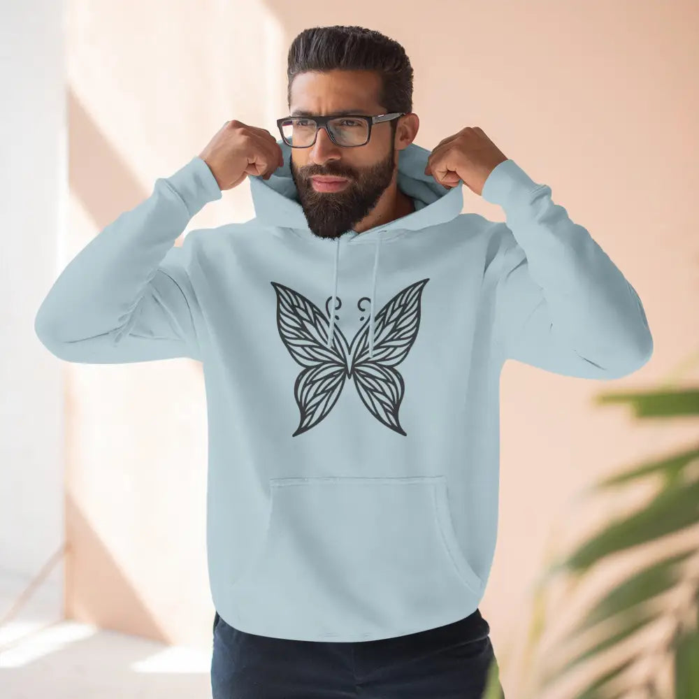 Light blue fleece hoodie with dark butterfly graphic, perfect for fall fashion and casual wear