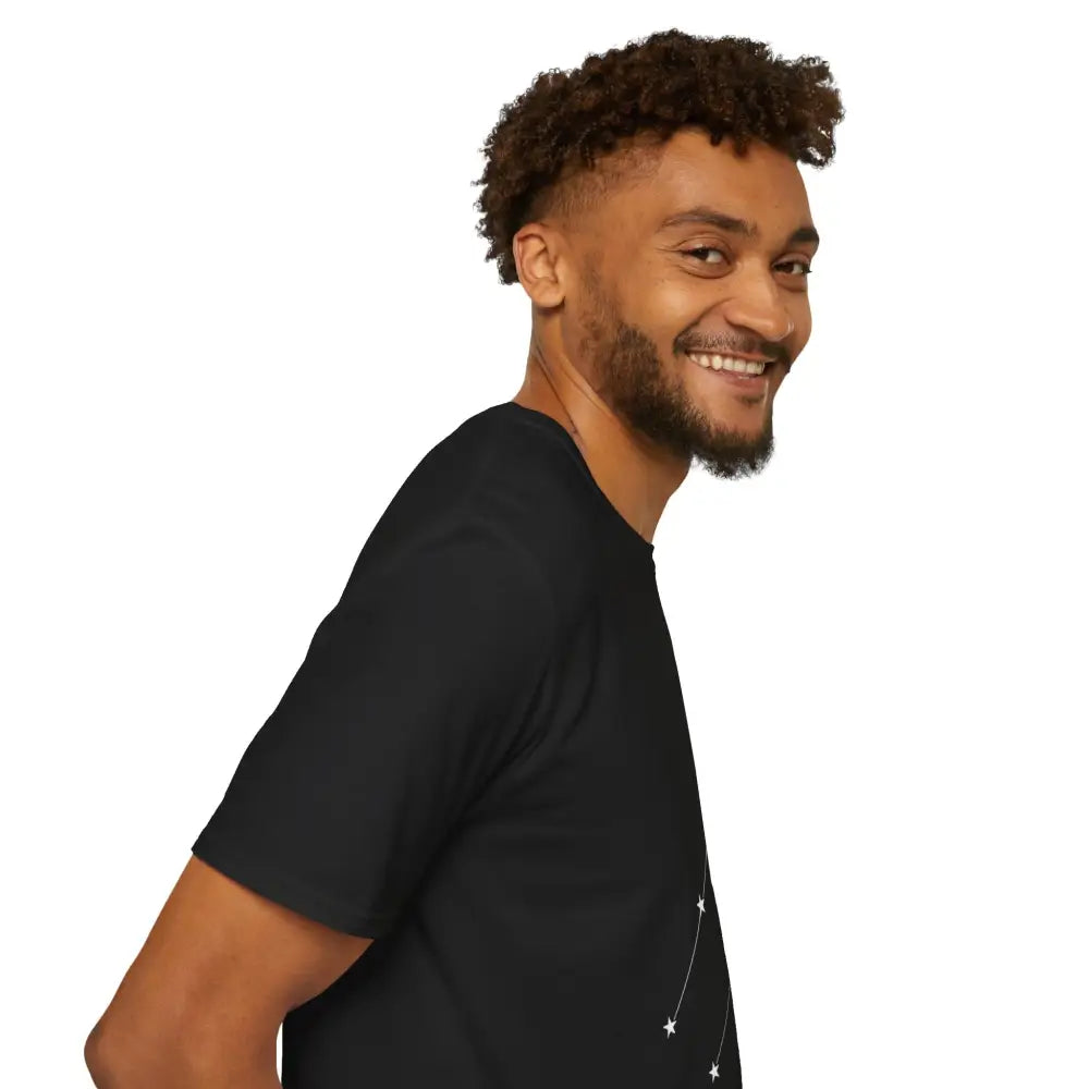 Smiling man wearing Celestial Constellation Unisex Softstyle T-Shirt with star sign design