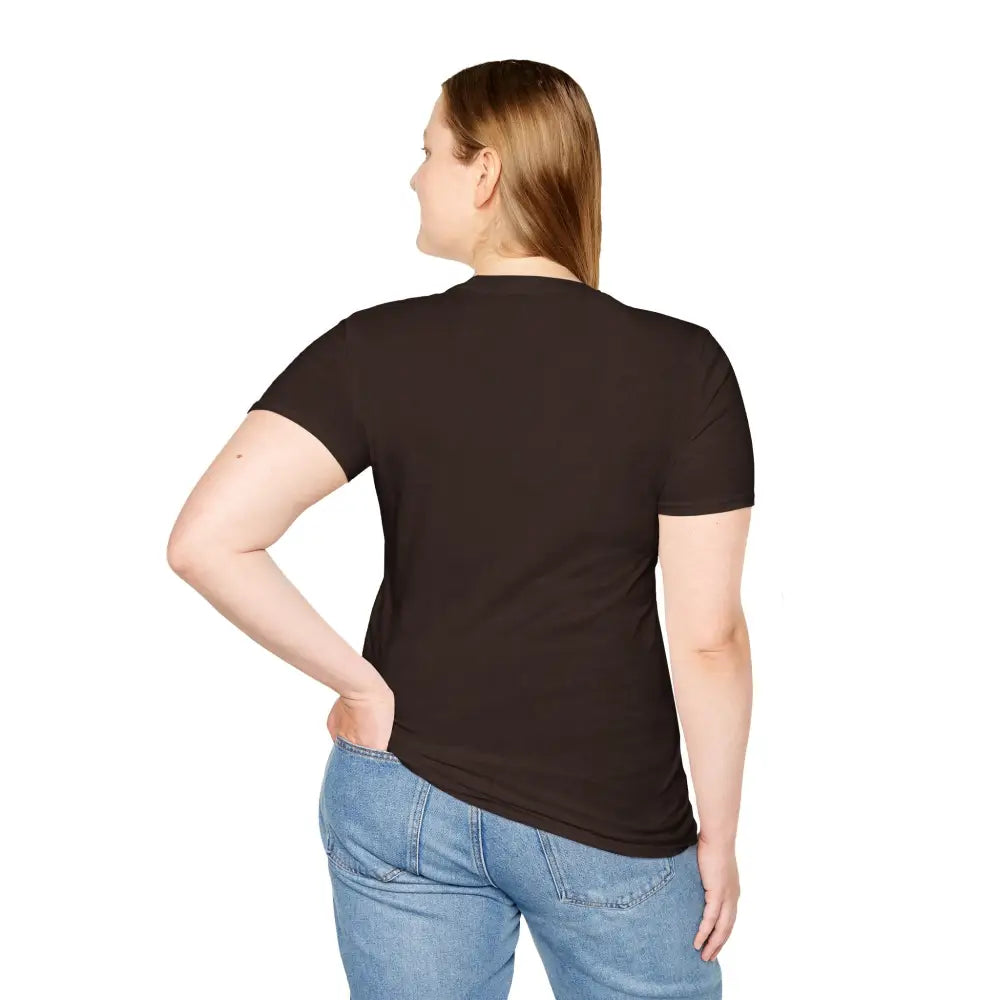 Woman in dark brown T-shirt and blue jeans, unisex softstyle astrology tee, low heat care