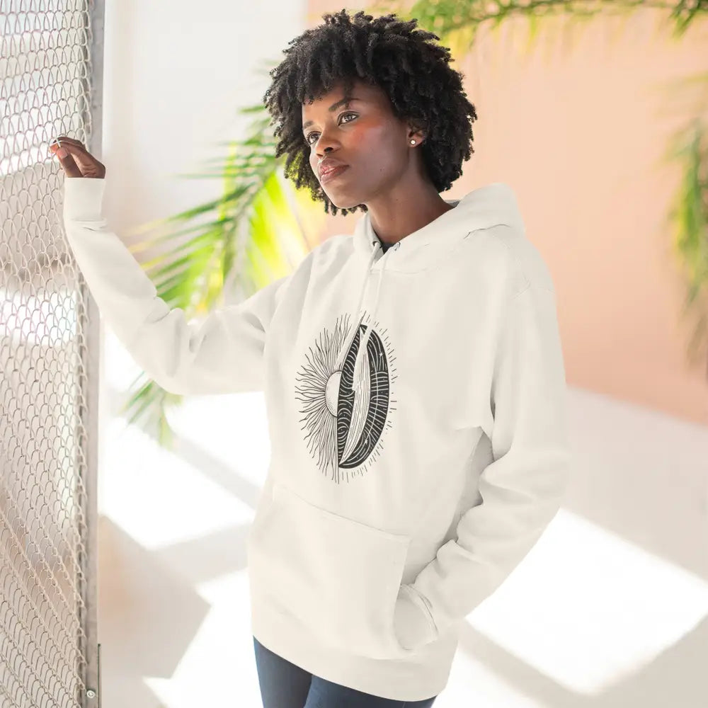 Woman in a white hooded sweatshirt with graphic design, cozy fleece hoodie with spacious kangaroo pocket