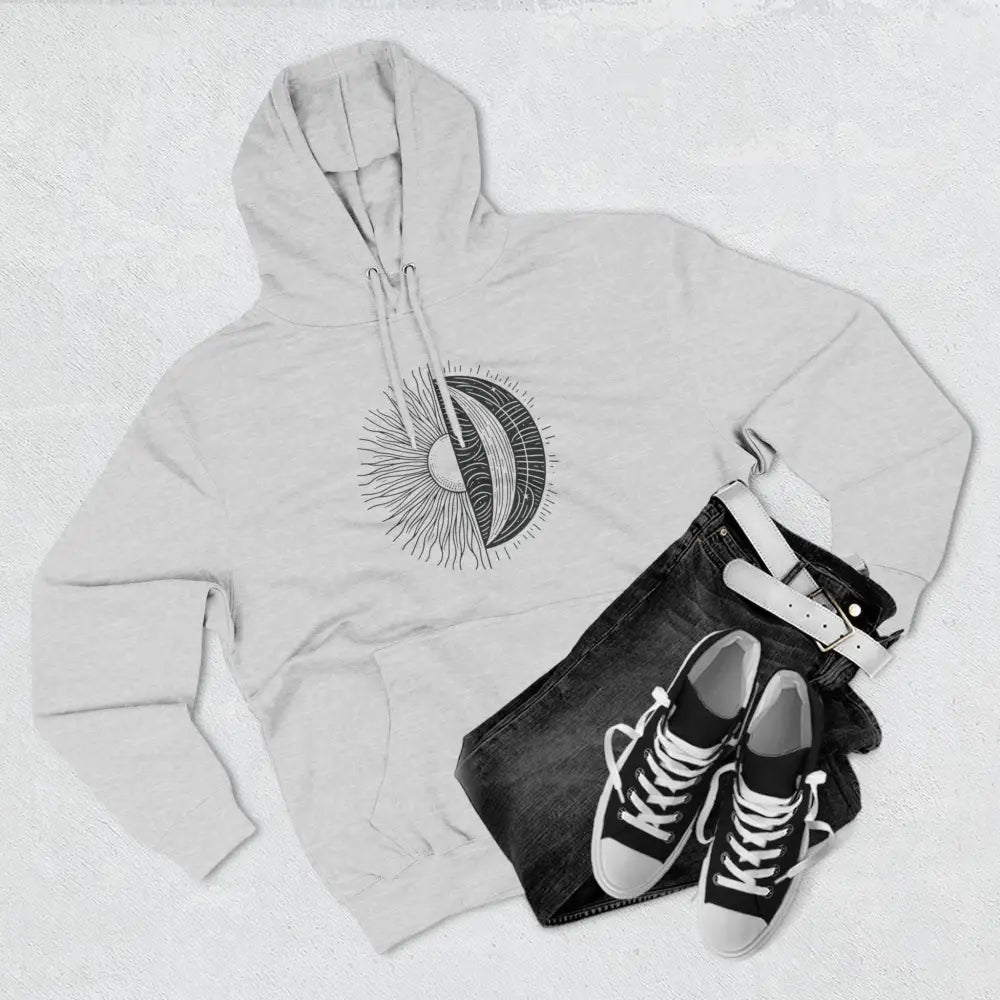 Light-colored Celestial Harmony unisex hoodie with sun and moon graphic, cozy fleece and spacious kangaroo pocket