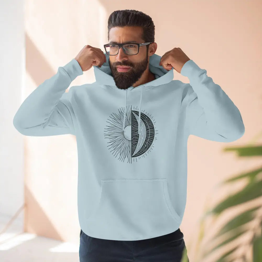 Light blue celestial hoodie with sun and moon graphic, cozy fleece with spacious kangaroo pocket