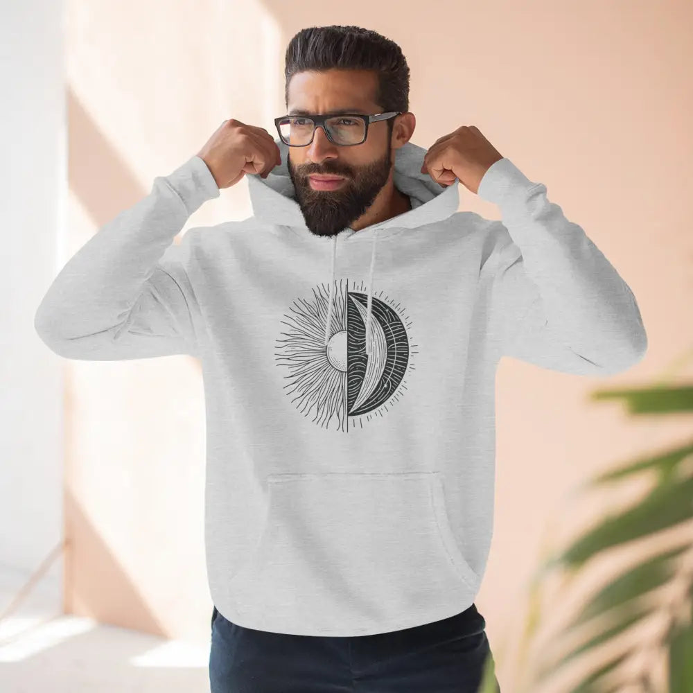 White cozy fleece hoodie with black sun and moon graphic, spacious kangaroo pocket, twill tape neck