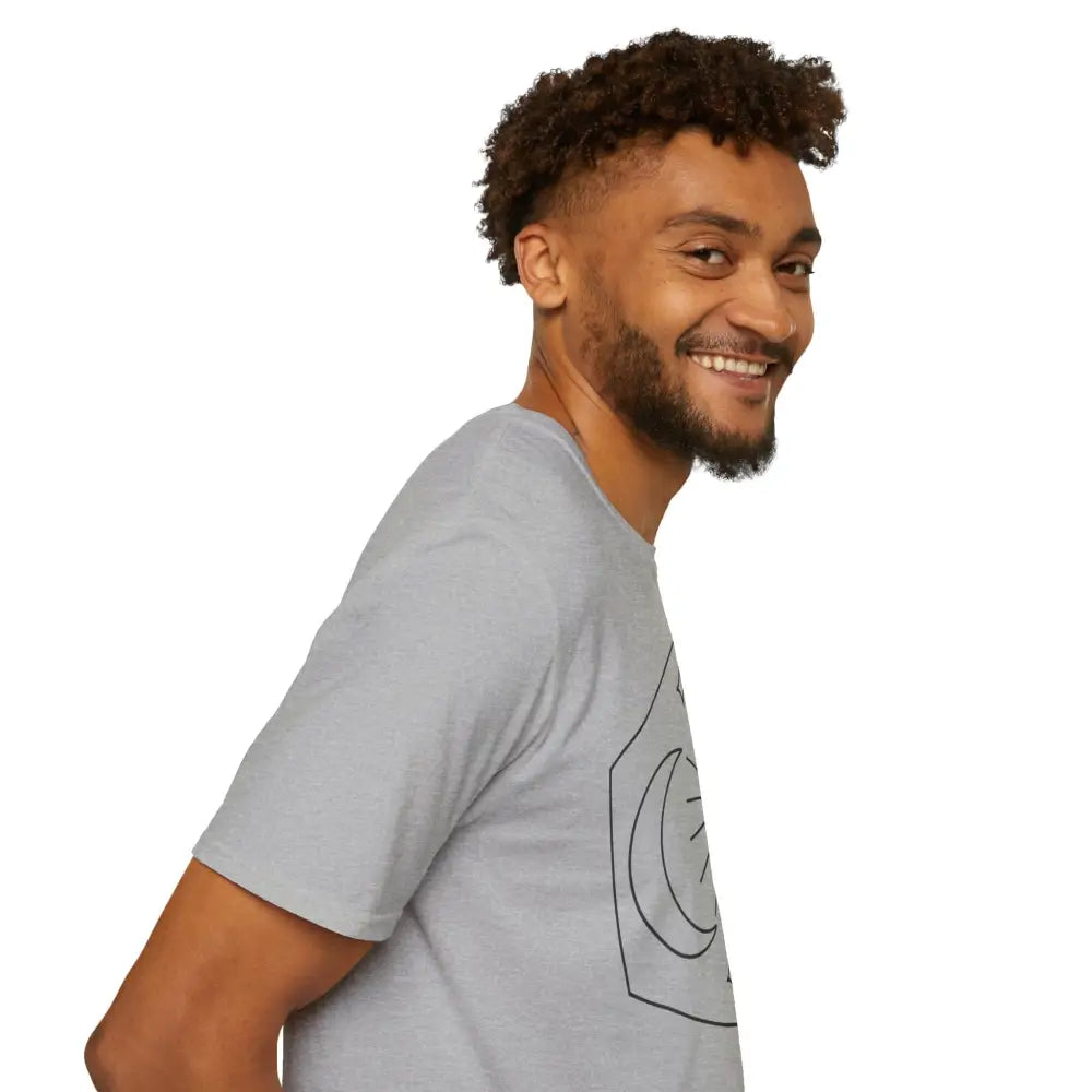Smiling man with beard and curly hair wearing Celestial Sun and Moon unisex T-shirt, ideal for astrology lovers