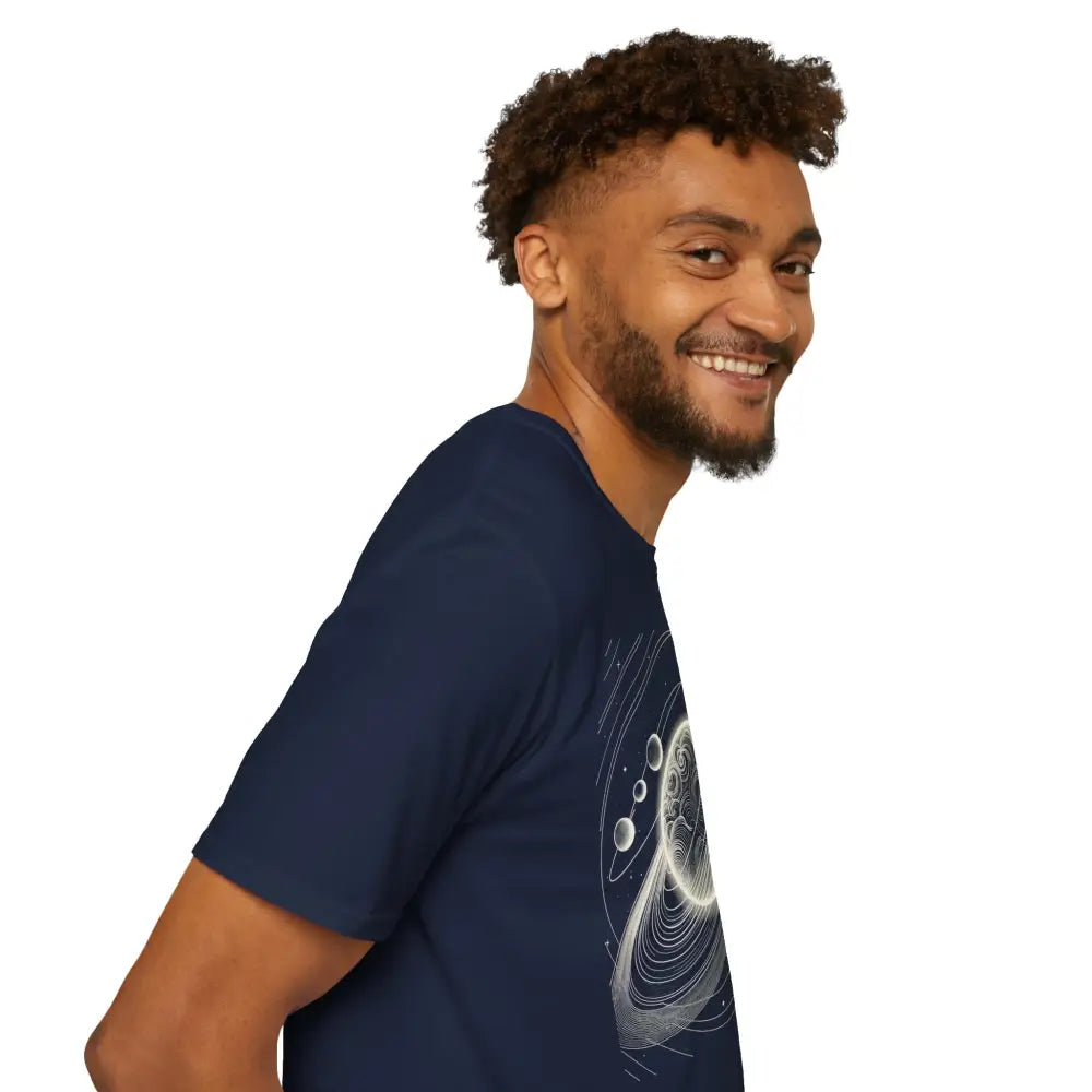 Smiling man in navy blue unisex softstyle t-shirt with mesmerizing cosmic design and celestial graphic