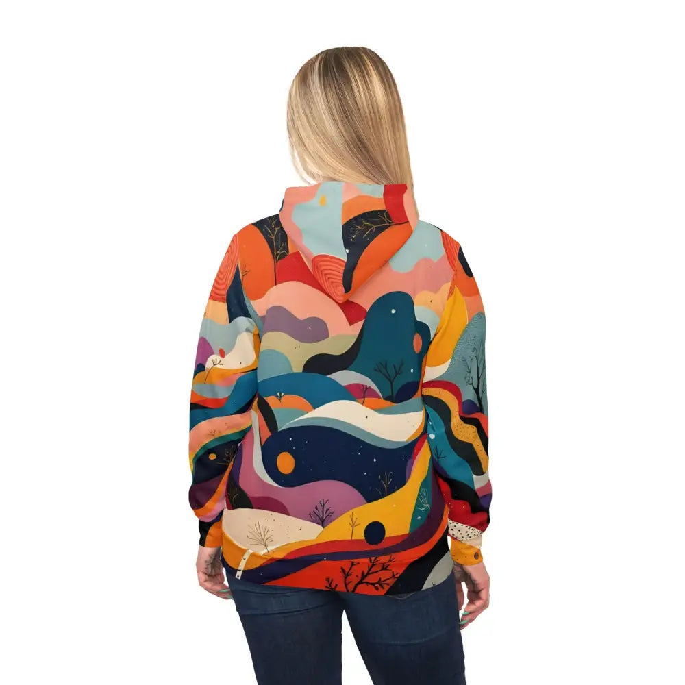 Colorful abstract landscape design on the Flowstate Mirage Urban Camo Hoodie for unisex festival wear