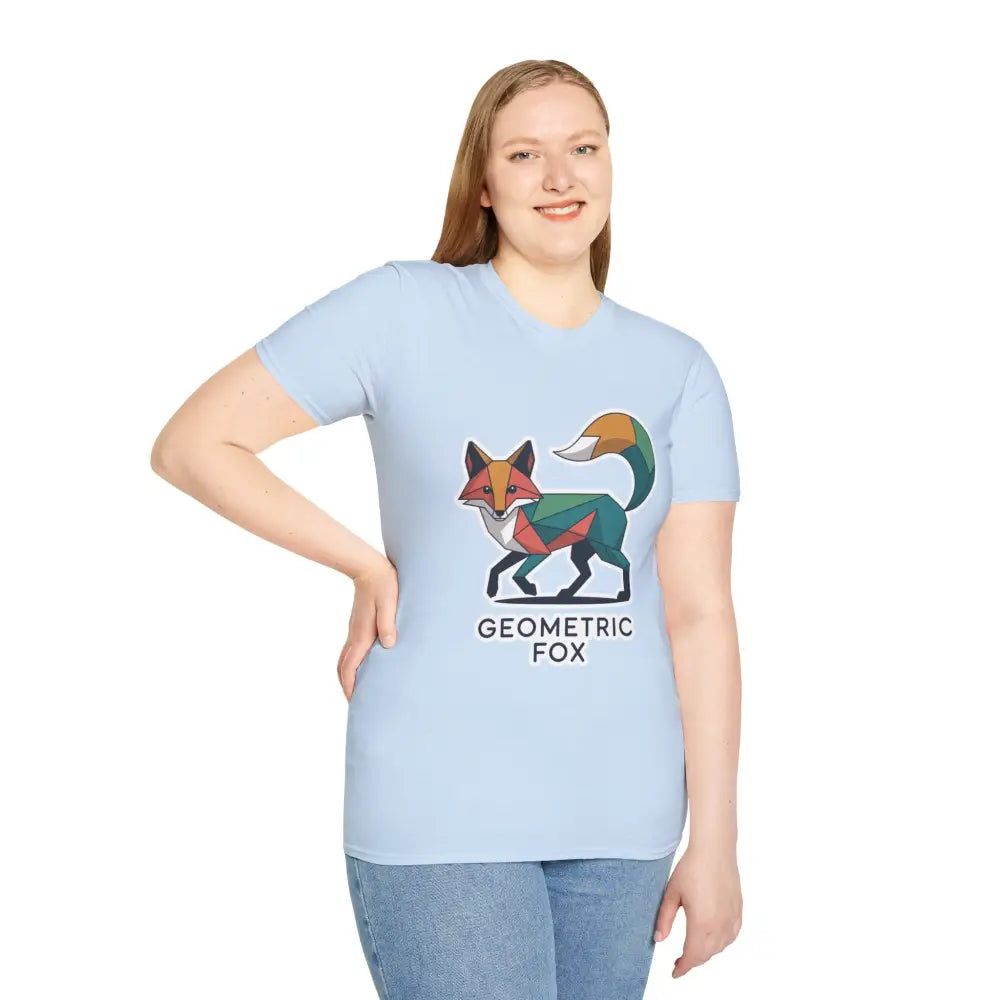 Young woman wearing a light blue unisex softstyle t-shirt with a unique geometric fox design for Earth Day