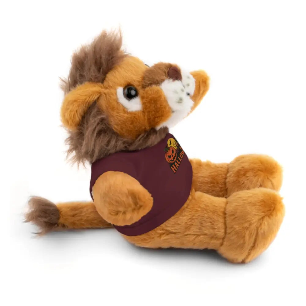 Brown plush lion wearing Halloween haunted house themed tee, collectible stuffed animal