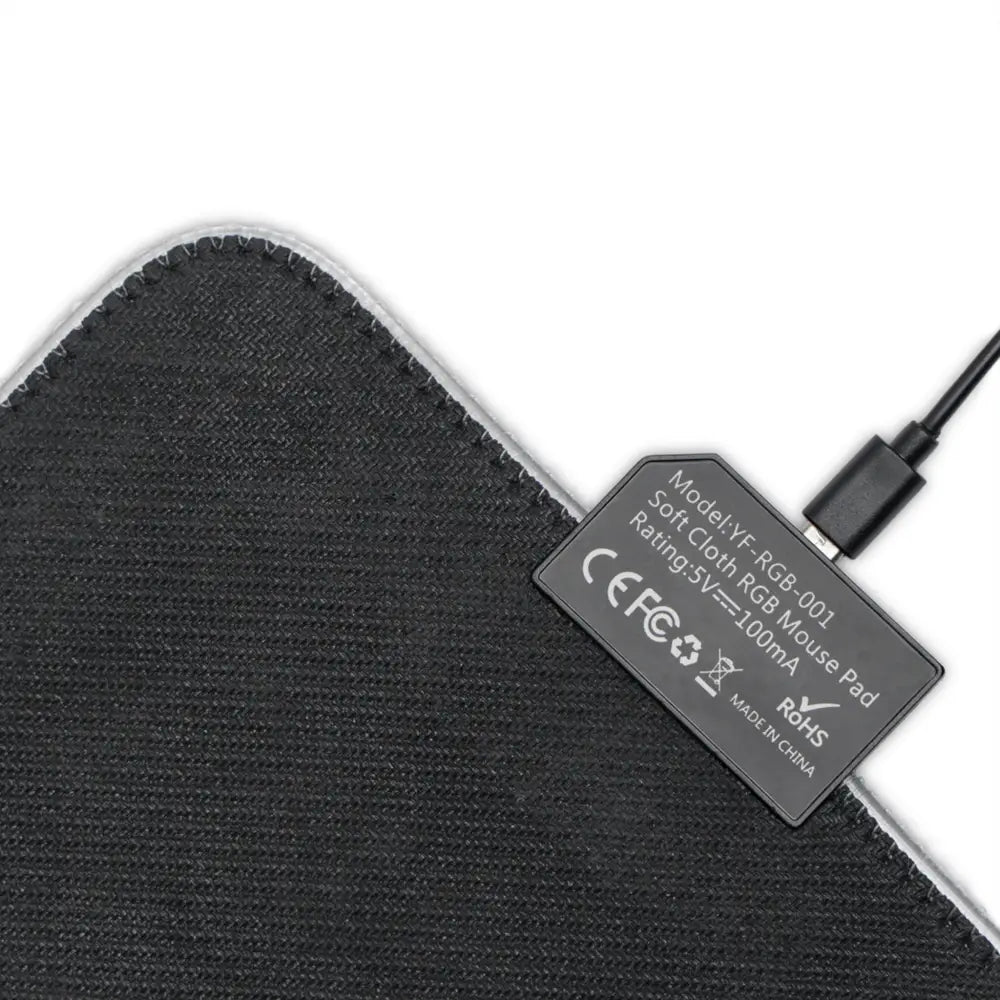 Black cloth RGB mouse pad with vibrant LED lighting for gaming and desktop use