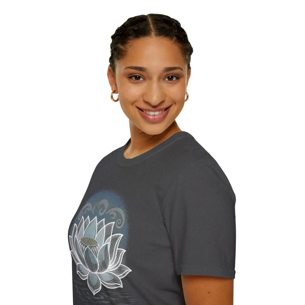 Woman wearing a lotus flower unisex softstyle t-shirt promoting reducing fabric waste and enhancing aesthetic appeal