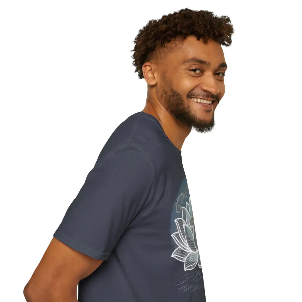Smiling man in unisex softstyle T-shirt with white Lotus flower design, enhancing aesthetic appeal