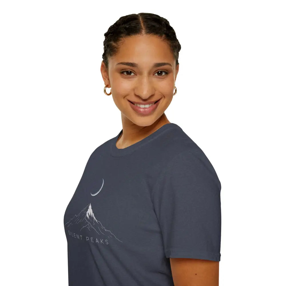 Woman wearing a softstyle t-shirt designed with mountain and moon graphic, eco-friendly fabric