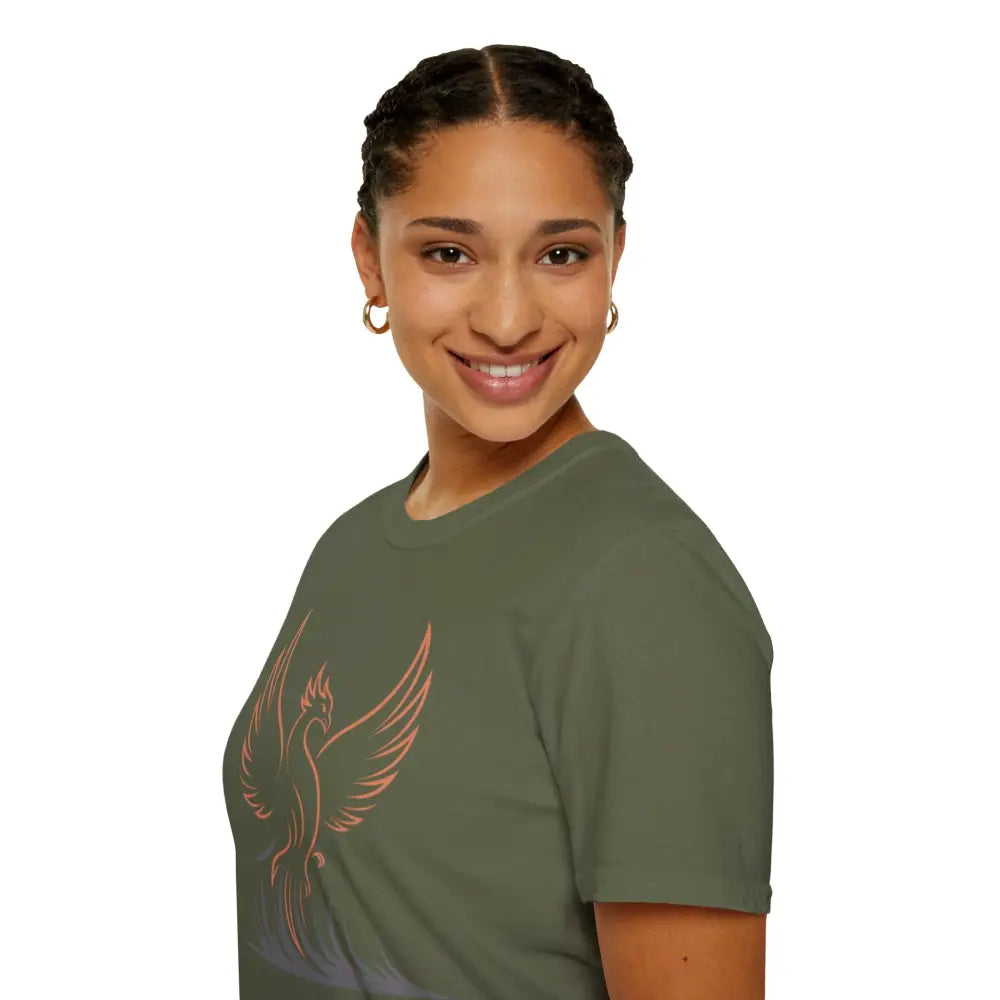 Woman in green Phoenix Rising T-Shirt with peach phoenix design, softstyle fabric, shoulder tape