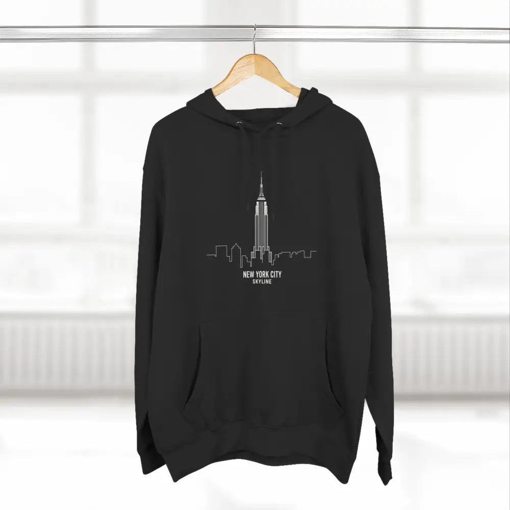 Black hoodie with white New York City skyline graphic, machine washable, low heat safe