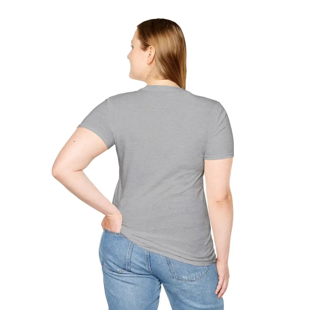 Gray short-sleeved T-shirt on woman with blue jeans, machine wash, tumble dry, low heat