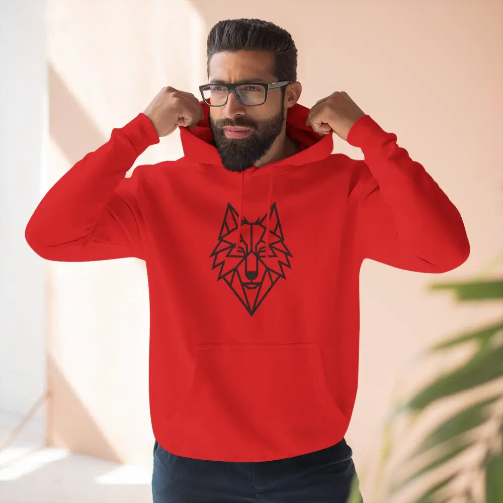 Bearded man wearing a red hoodie with a stylish wolf graphic for outdoor adventures