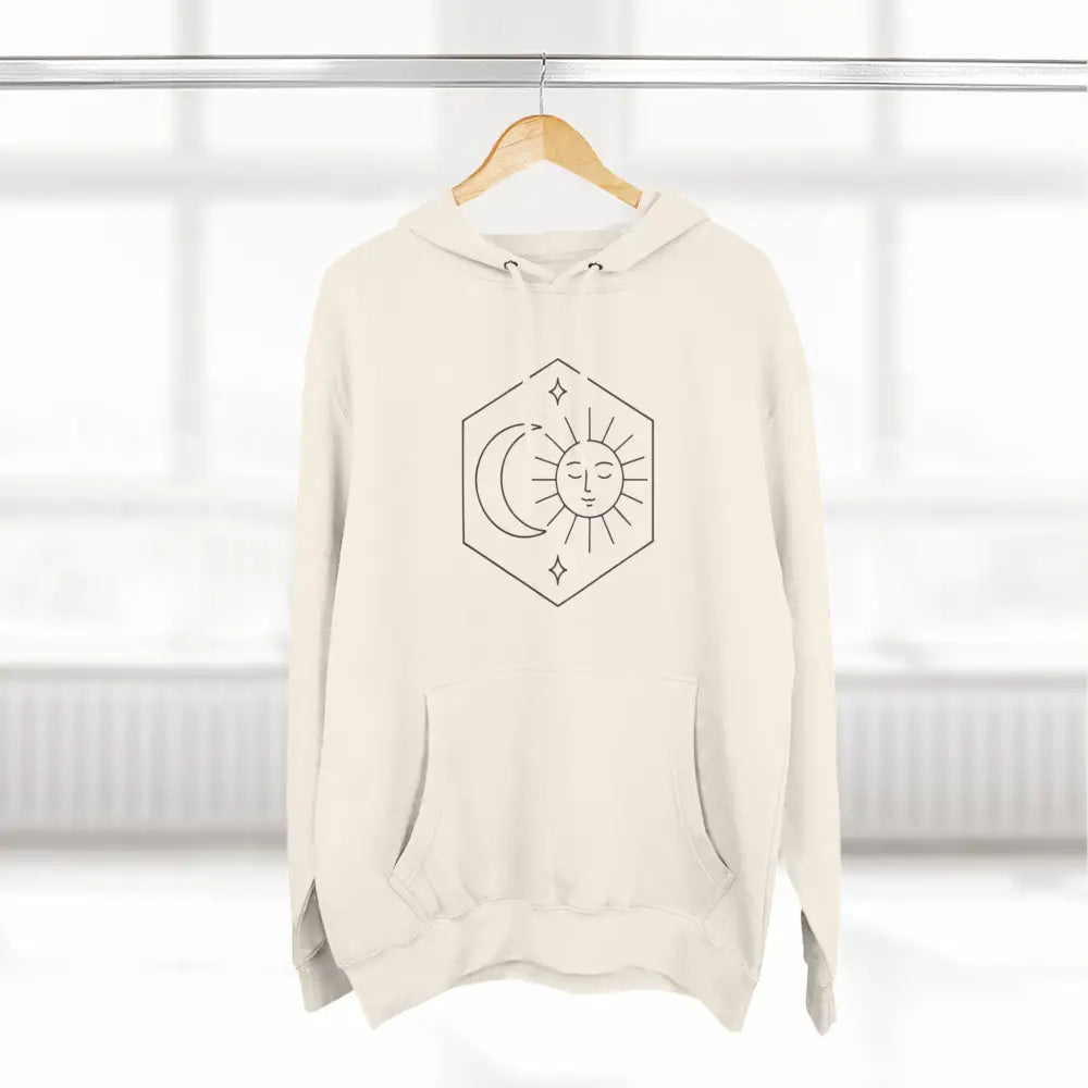 Cream-colored fleece hoodie with sun and moon celestial graphic, cozy fleece sweatshirt
