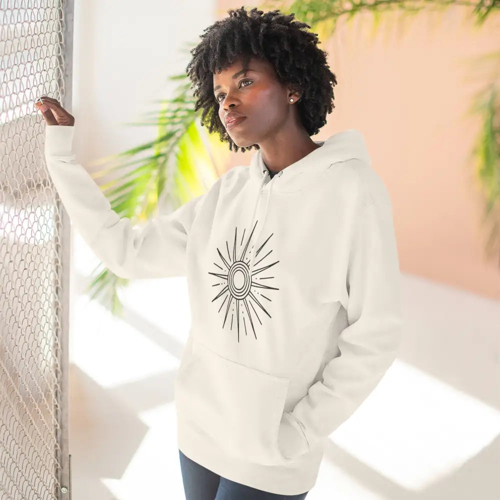 Unisex fleece hoodie with black sunburst design, spacious kangaroo pocket, cozy warm layer